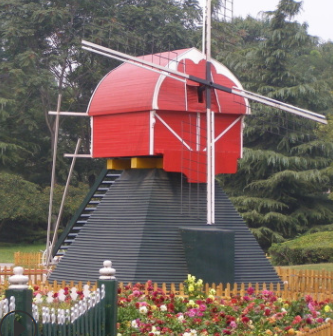 廠家直銷大型戶外景觀防腐木花海風(fēng)車鄉(xiāng)村園林景區(qū)裝飾風(fēng)車水車